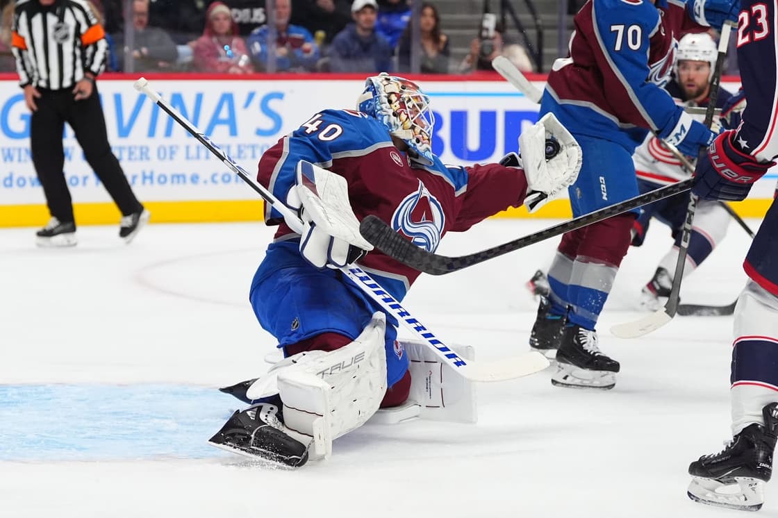 Oct 12, 2024; Denver, Colorado, USA; Colorado Avalanche goaltender Alexandar Georgiev (40) makes a save in the first period against the Columbus Blue Jackets at Ball Arena. Mandatory Credit: Ron Chenoy-Imagn Images